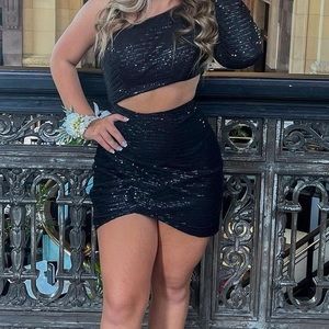 Black dress, in very well shape, one piece without cutout in the middle